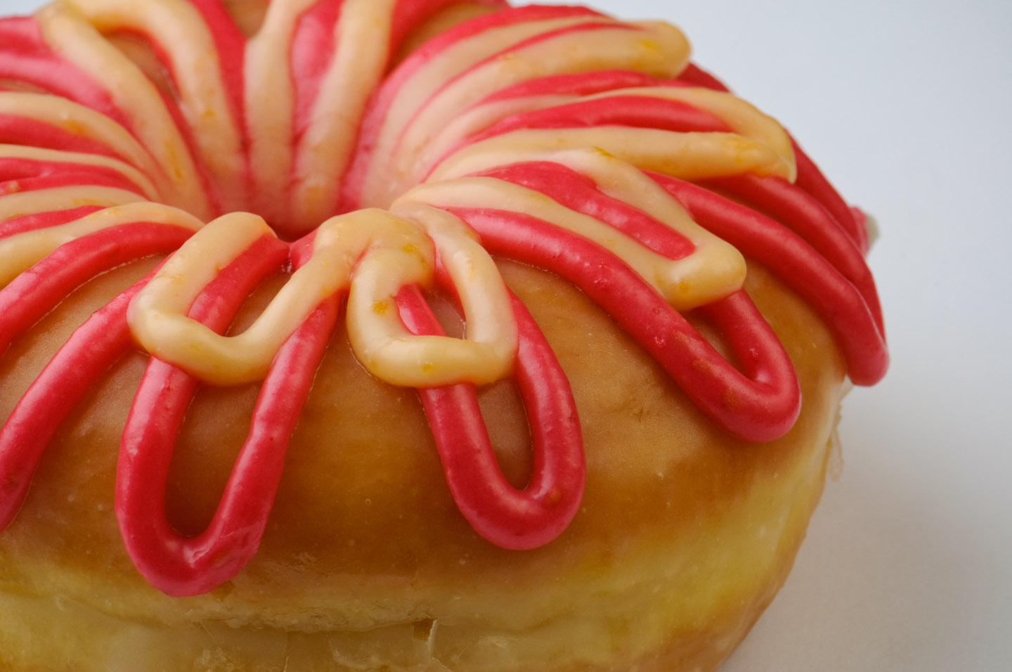 Red and Orange frosted donut