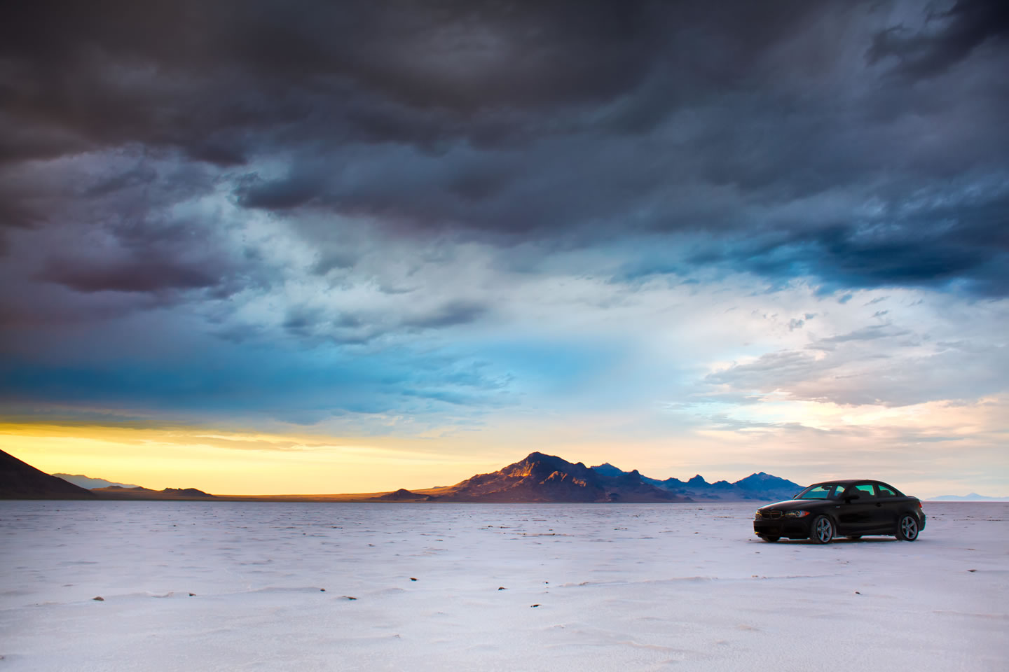 A BMW races across the Bonneville Salt Flats